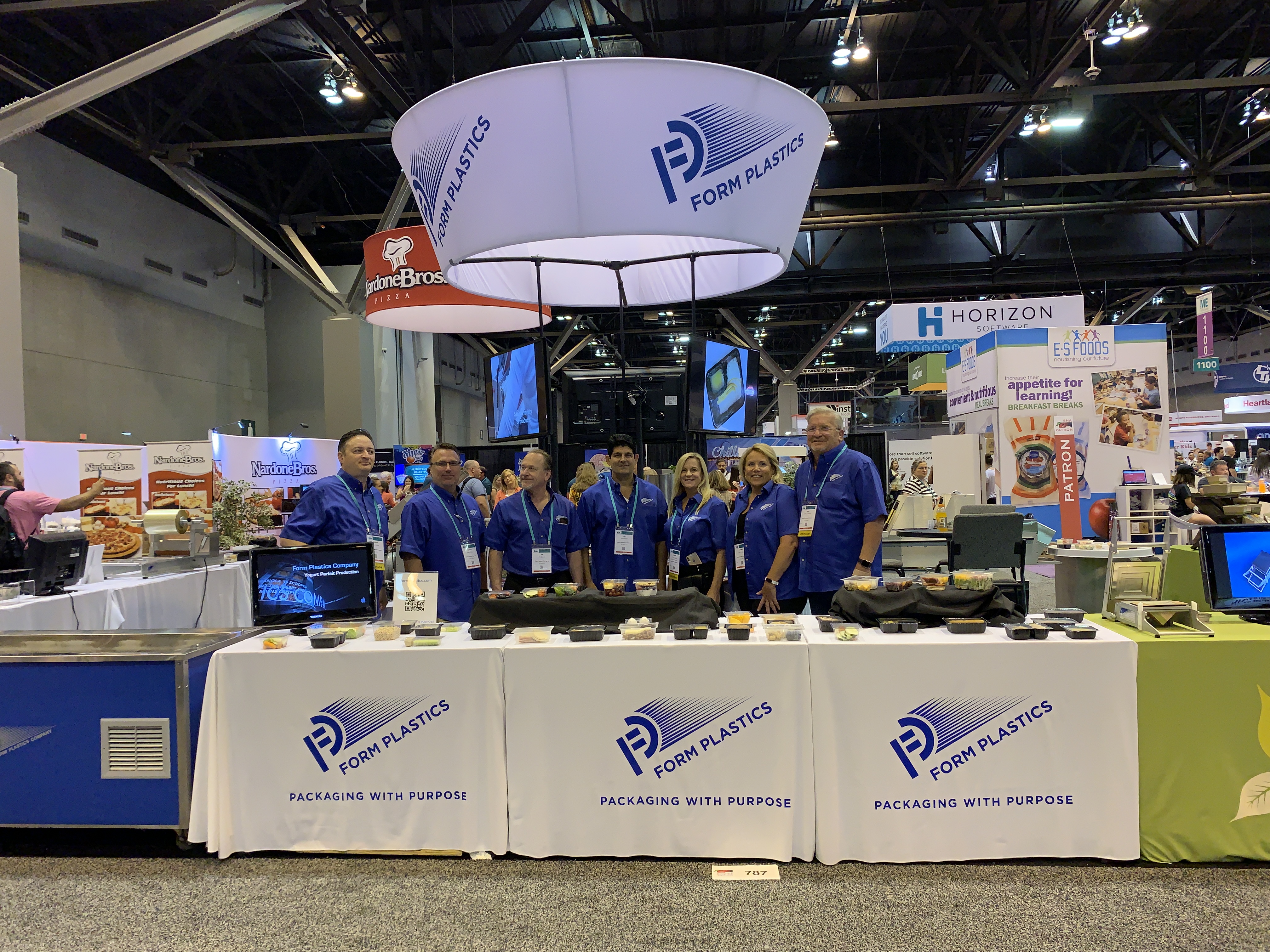 Form Plastics team at trade show